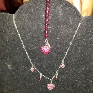 Necklace, earrings and 2 bracelets.
